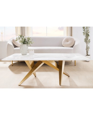 Table basse CELENIA – 130 cm en céramique effet marbre blanc & structure dorée champagne