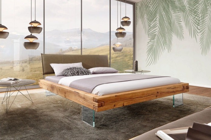 Lit chêne massif sauvage huilé - Pieds verre trempé design - tête de lit matelassée -