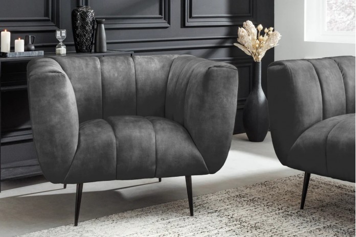 Fauteuil ultra Design rembourré velours gris et pieds noirs Noble
