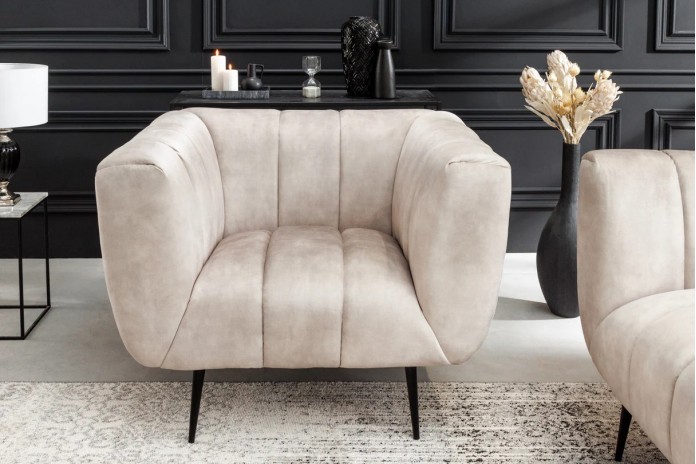 Fauteuil ultra Design rembourré velours velvet champagne et pieds noirs Noble