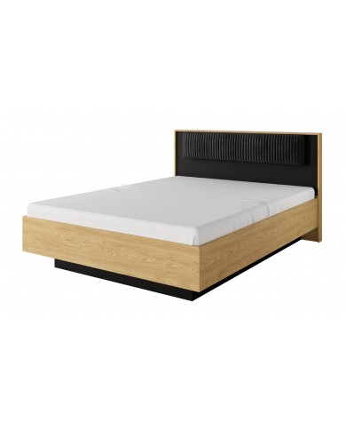 Armoire BALTINO – Élégance moderne, fonctionnalité maximale  Le style urbain chic s’invite dans votre chambre